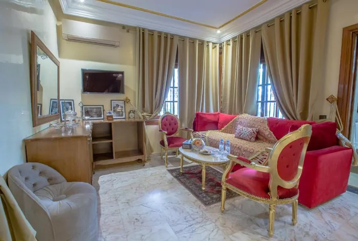 Deluxe King Suite (Fatiha) at Riad Sebti — interior view 1.