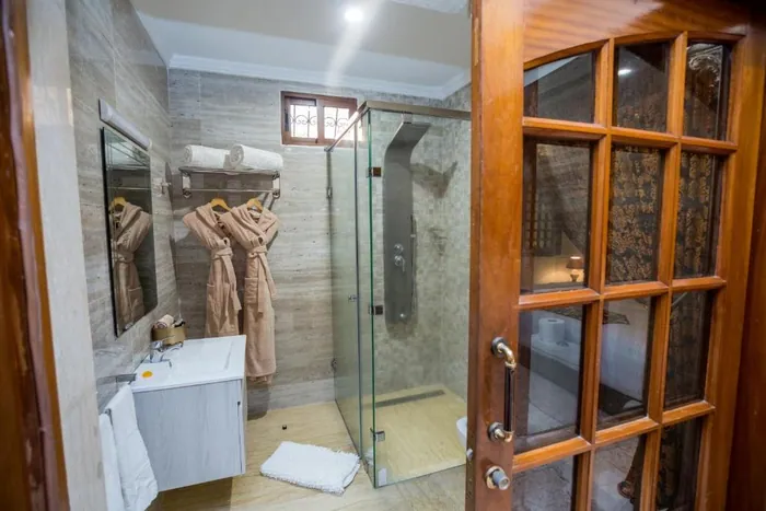 Deluxe King Suite (Fatiha) at Riad Sebti — interior view 3.